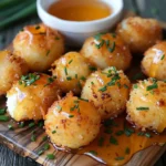 Fried Brie Bites on a Wooden Board