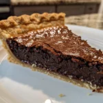 Rich Dark Chocolate Chess Pie on a Rustic Table